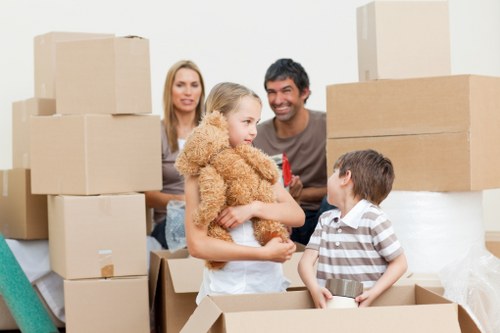 Professional movers transporting furniture during a Streatham house relocation